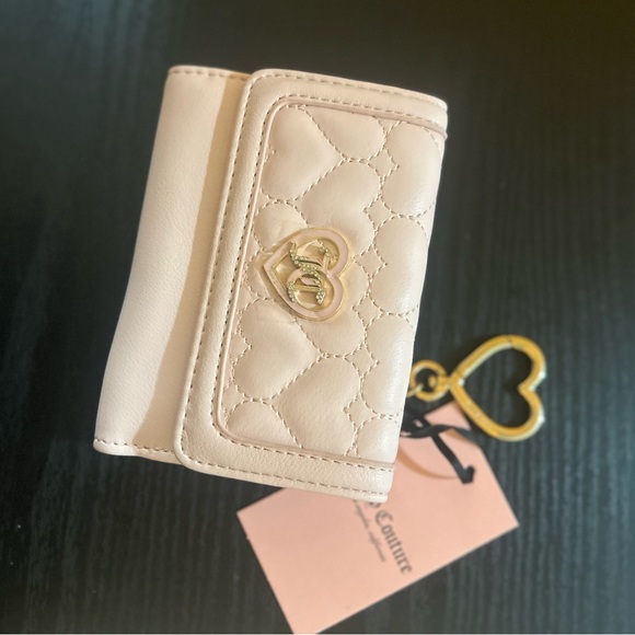 Juicy Couture Handbags - Juicy couture baby pink wallet
